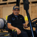 Pro-Craft Restoration technician preparing equipment inside the facility.