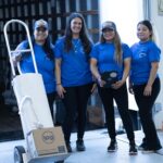 Pro-Craft Restoration team members handling restoration equipment.